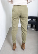 KUT Kiera High Rise Barrel Jean- Olive-Hand In Pocket