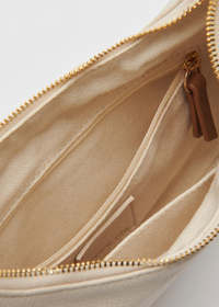 Dolce Vita Keena Convertible Wristlet Bag- Ivory-Hand In Pocket