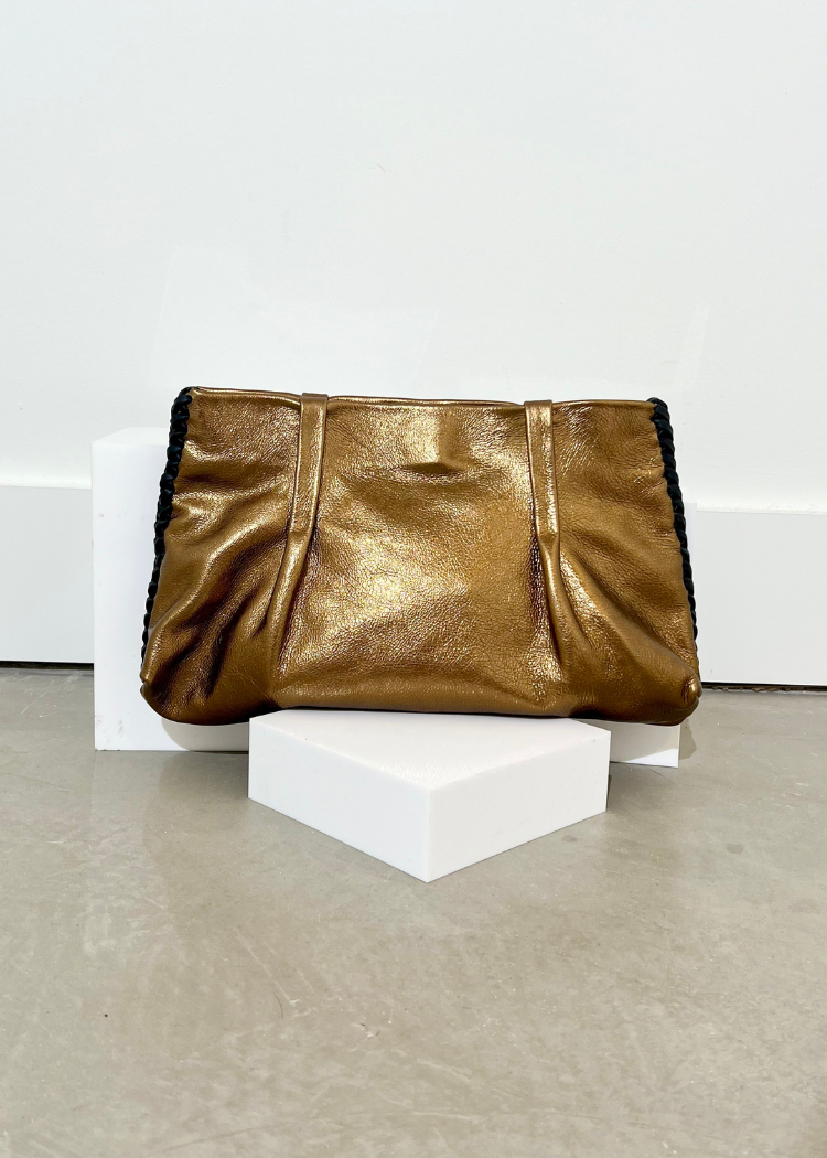 Ciel Oversized Clutch- Bronze-Hand In Pocket