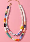 Bonaire "Have a Nice Day"Beaded Loop-Hand In Pocket