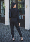 Bobi Long Sleeve Surplice Jumpsuit -Black-Hand In Pocket