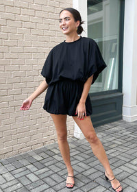 Virginia Short Sleeve Sleeve Bubble Hem Romper-Black-Hand In Pocket