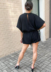 Virginia Short Sleeve Sleeve Bubble Hem Romper-Black-Hand In Pocket