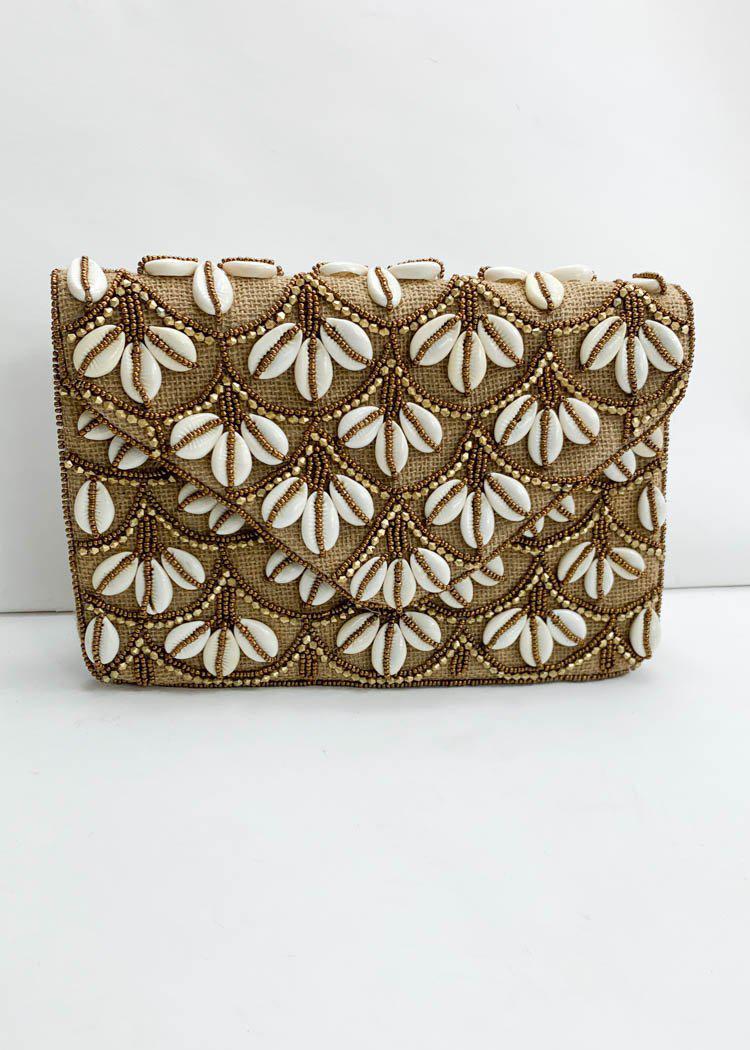 Jakarta Puka Shell Clutch-Hand In Pocket