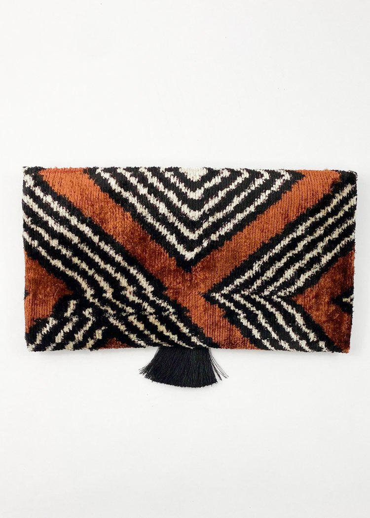 Wolf & Willa Chocolate and Black Envelope Clutch-Hand In Pocket