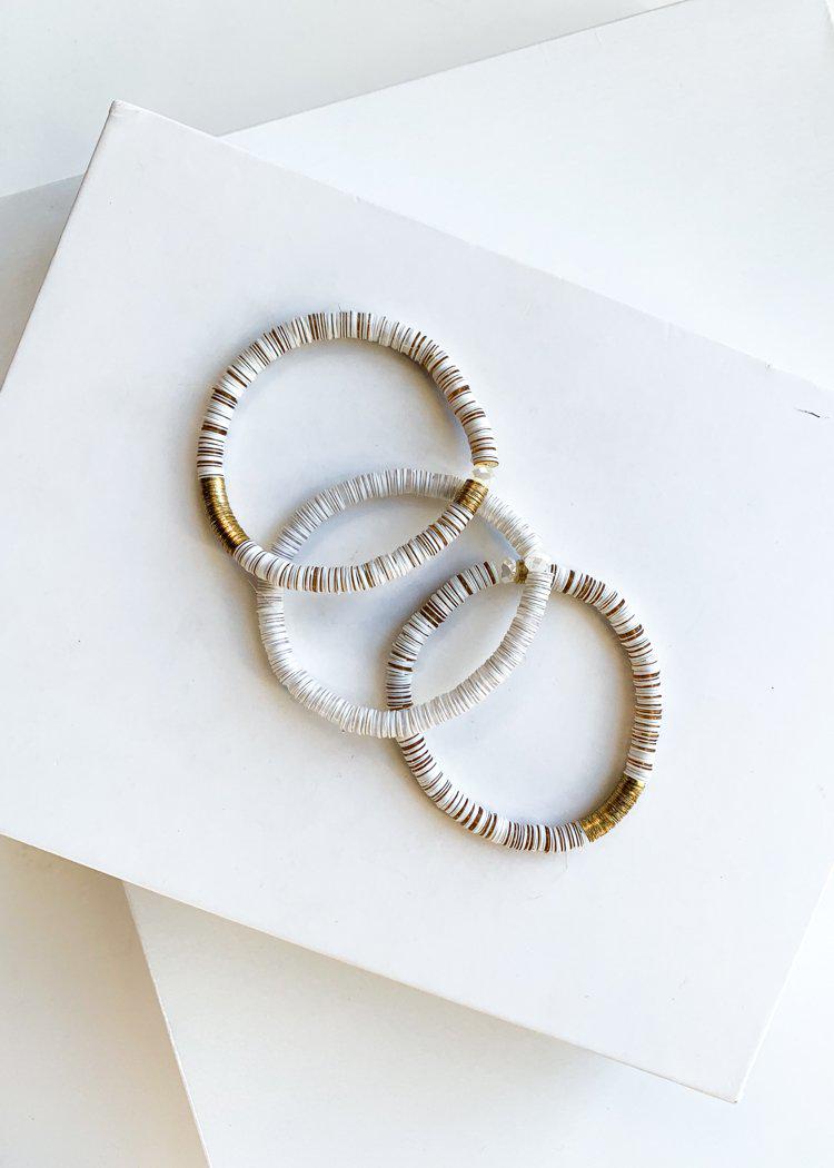 White and Gold Cardiff Disc Beaded Stretch Bracelet-Hand In Pocket