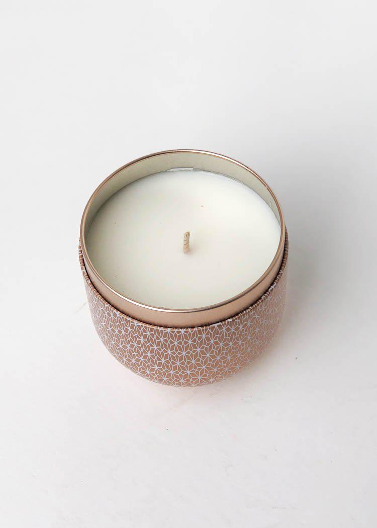 Capri Blue Gilded Muse Pink Grapefuit and Prosecco Tin Candle-Hand In Pocket