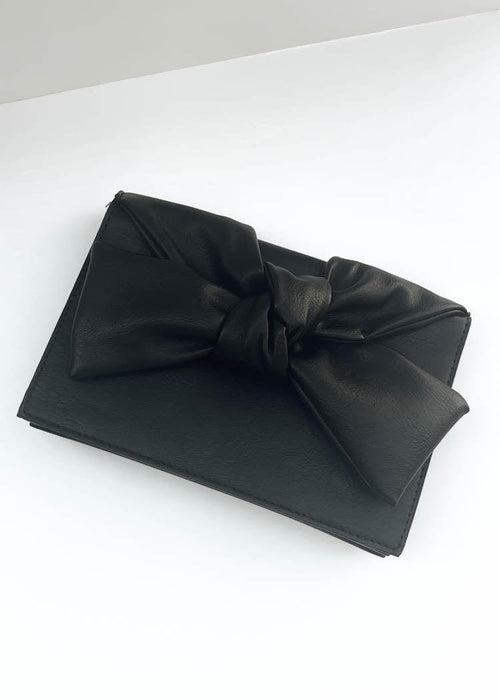 Samantha Bow Clutch-Hand In Pocket