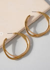 Nora Twisted Hoop-Gold-Hand In Pocket